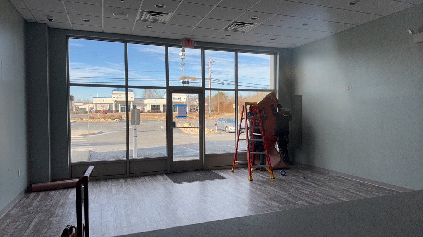Nail salon storefront window and interior work